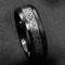 Black ring with Celtic knot design.
