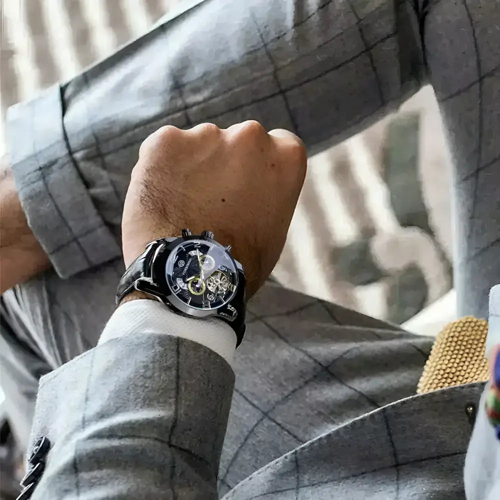FORSINING black leather automatic watch with visible gears and sophisticated design