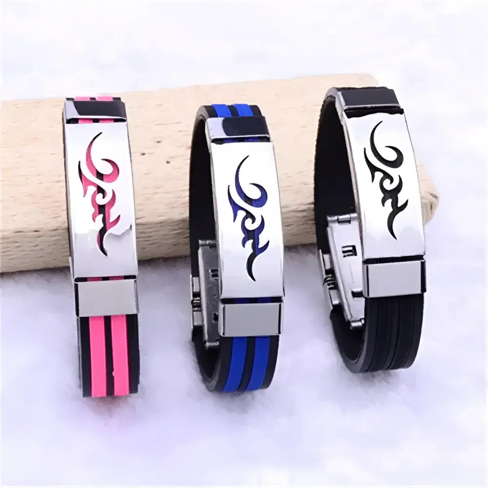 Three tribal-tattooed wristbands.