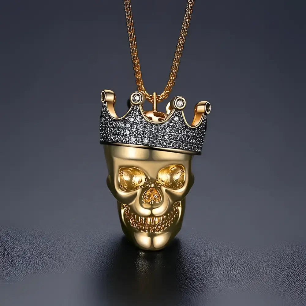 Gold skull pendant with jeweled crown.