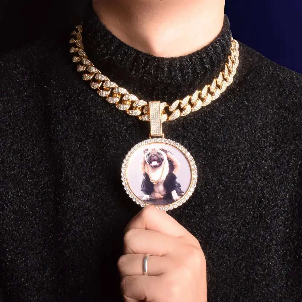 Gold chain with dog photo pendant.