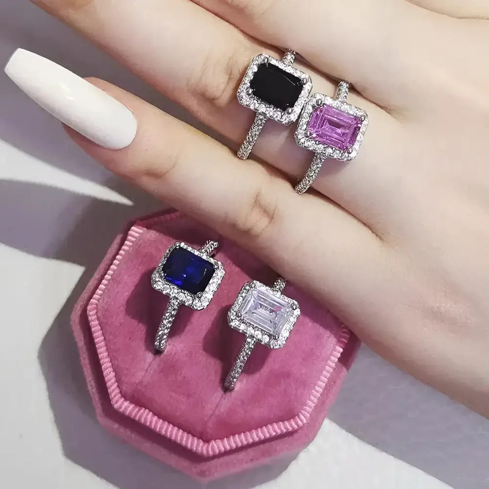 Assorted gemstone rings.