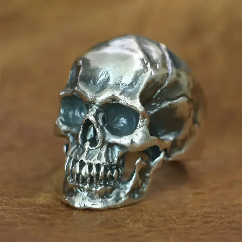 Silver skull ring.