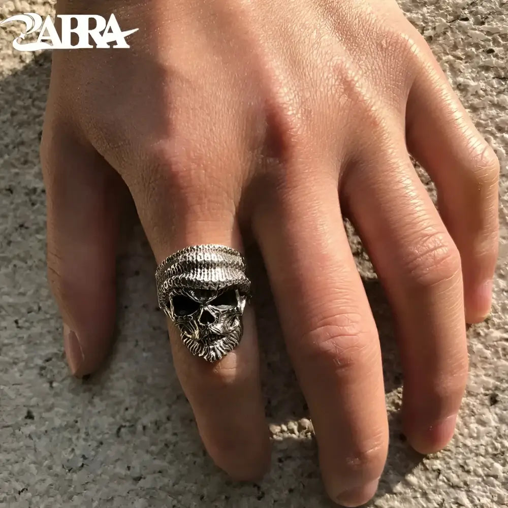 Silver skull ring.