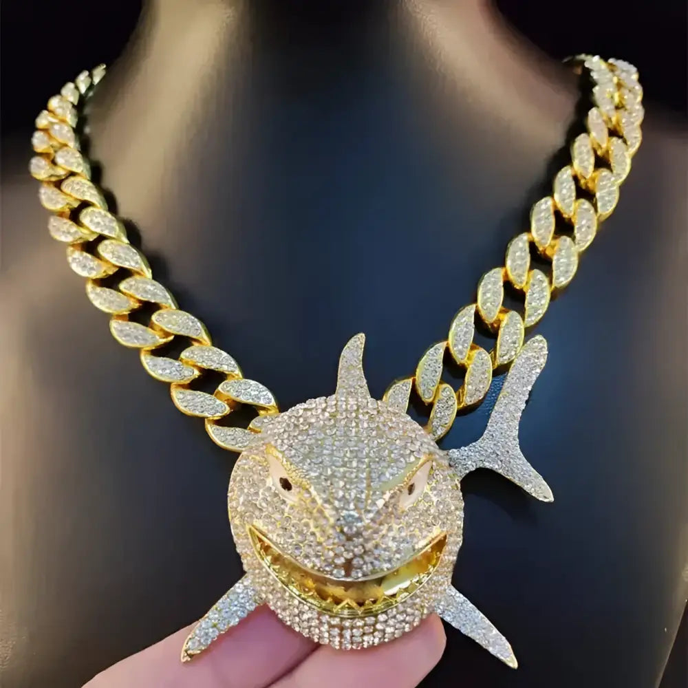 Diamond-encrusted shark pendant necklace.