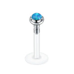 Blue opal labret piercing.