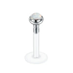 Labret piercing with opal.