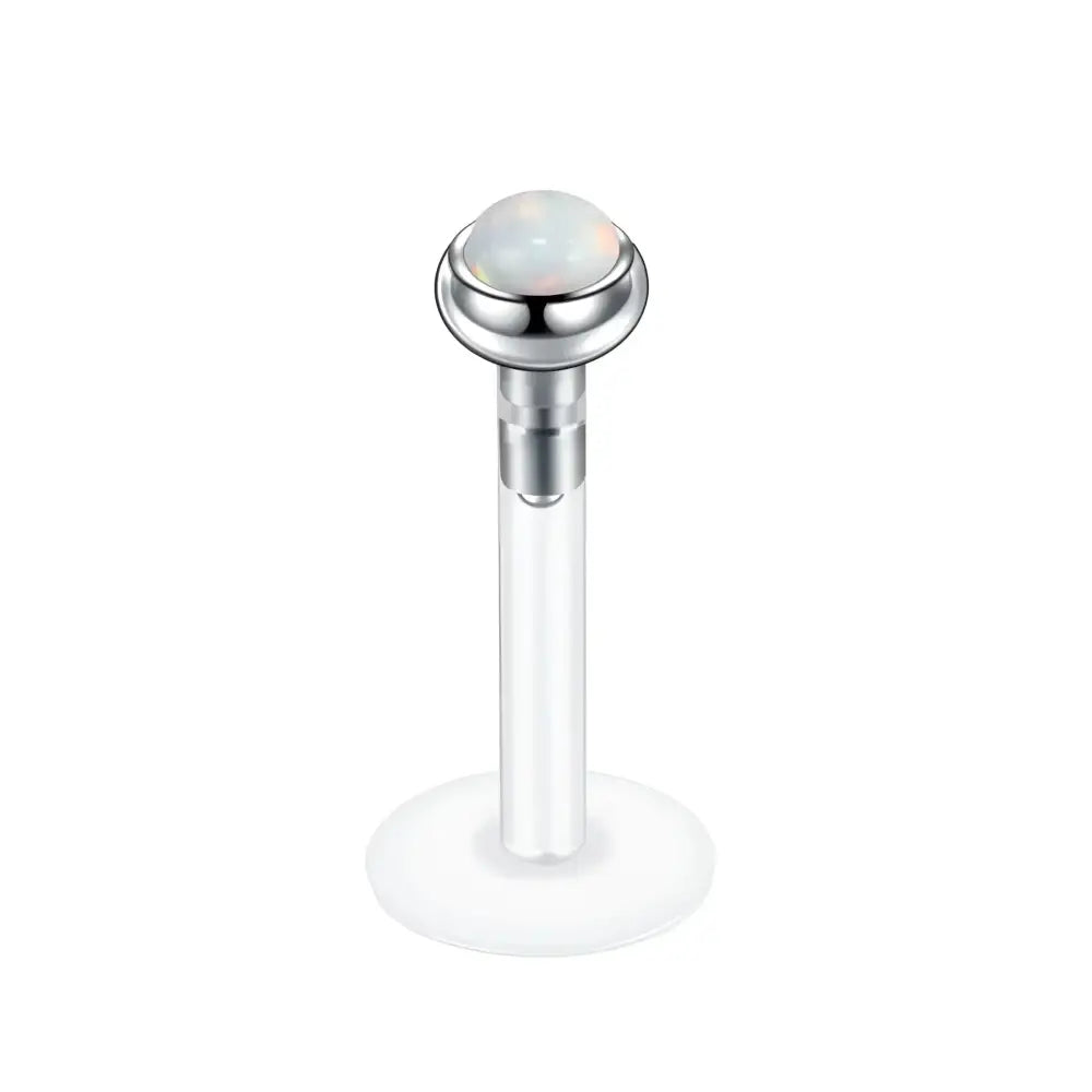 Labret piercing with opal.