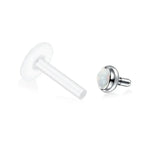 Two-piece labret piercing with opal.