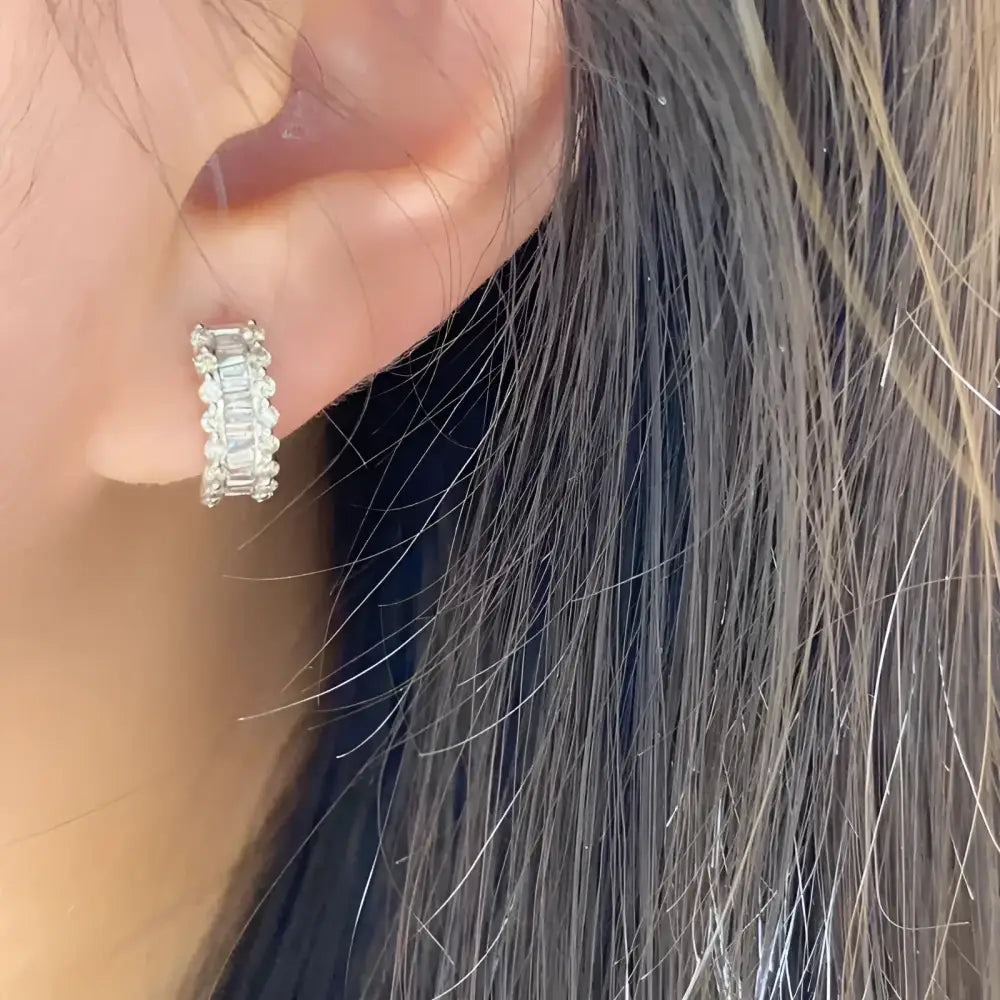 Diamond hoop earring.