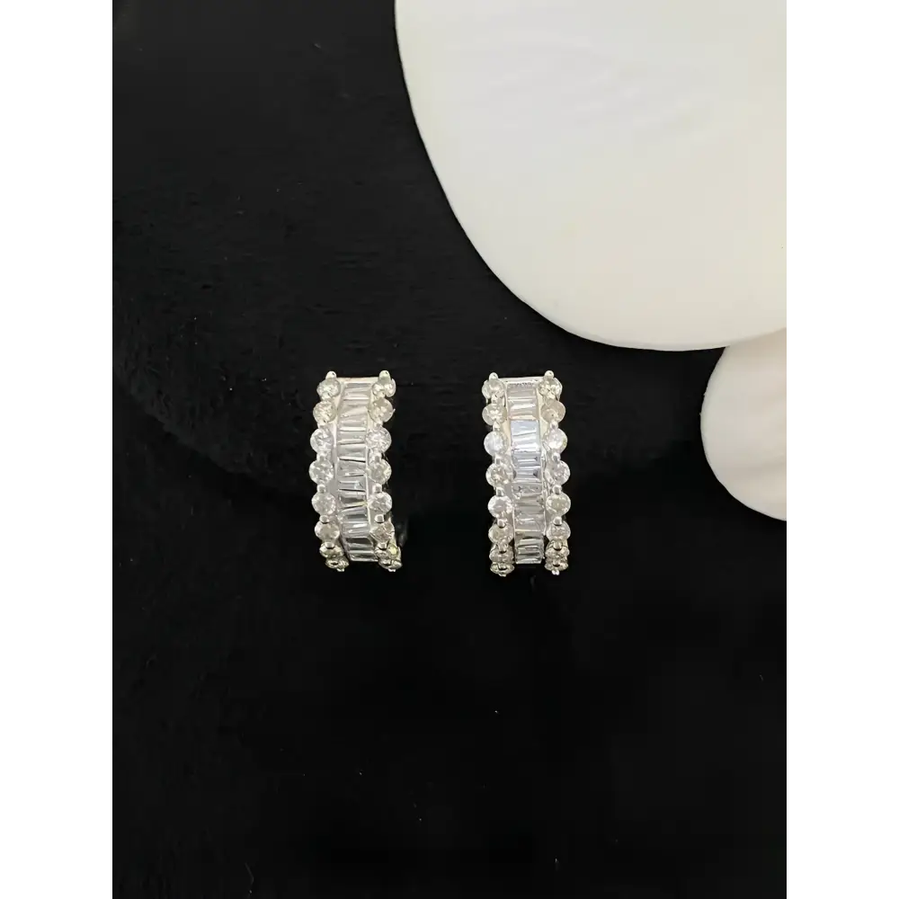 Sparkling diamond hoop earrings.