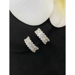 Sparkling silver hoop earrings.