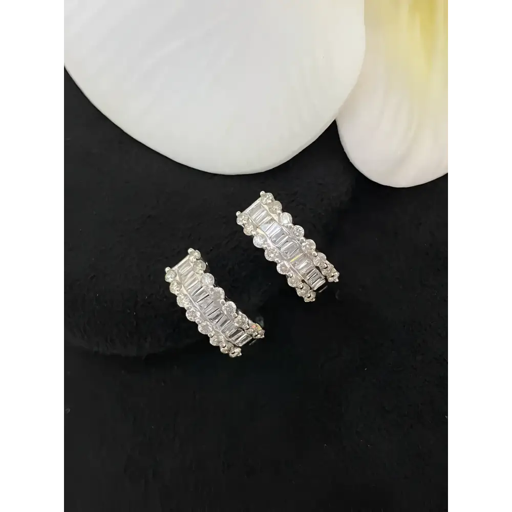 Sparkling silver hoop earrings.
