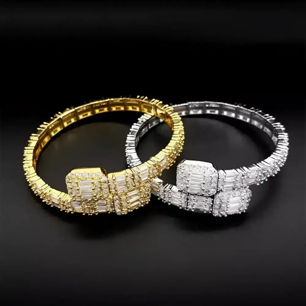 Gold and silver diamond-studded bracelets.