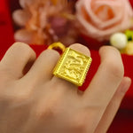 Gold dragon ring.