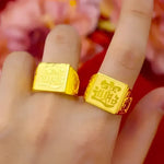 Two gold signet rings.