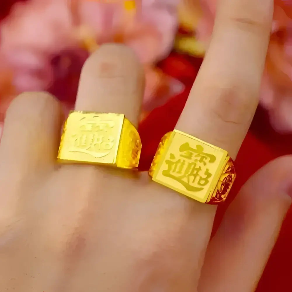 Two gold signet rings.
