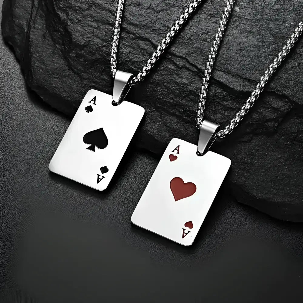 Two ace card pendant necklaces.