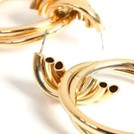 Gold-toned triple hoop earrings.