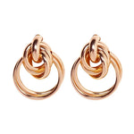 Pair of gold knot earrings.
