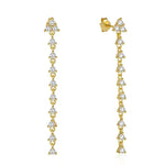 Gold-toned dangling earrings with cubic zirconia.