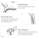 Silver jewelry details.