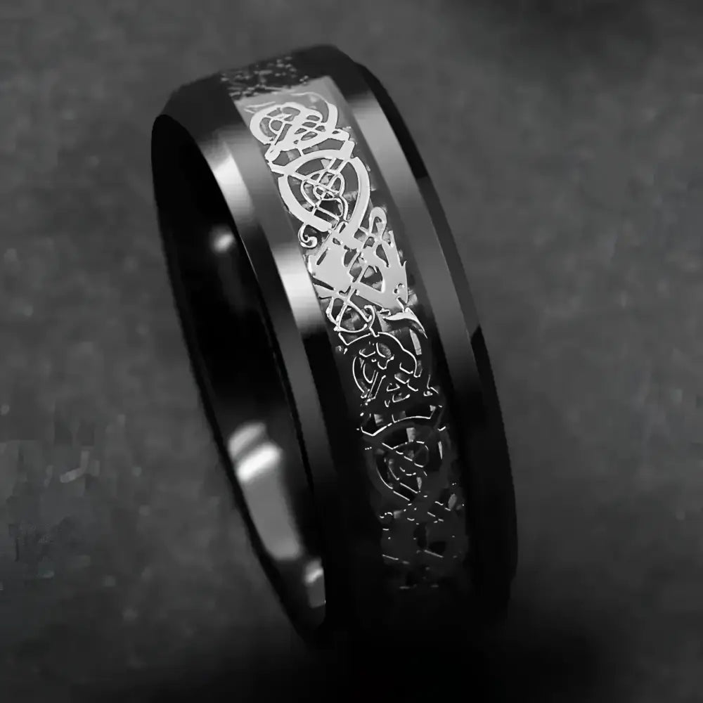 Black ring with Celtic knot design.