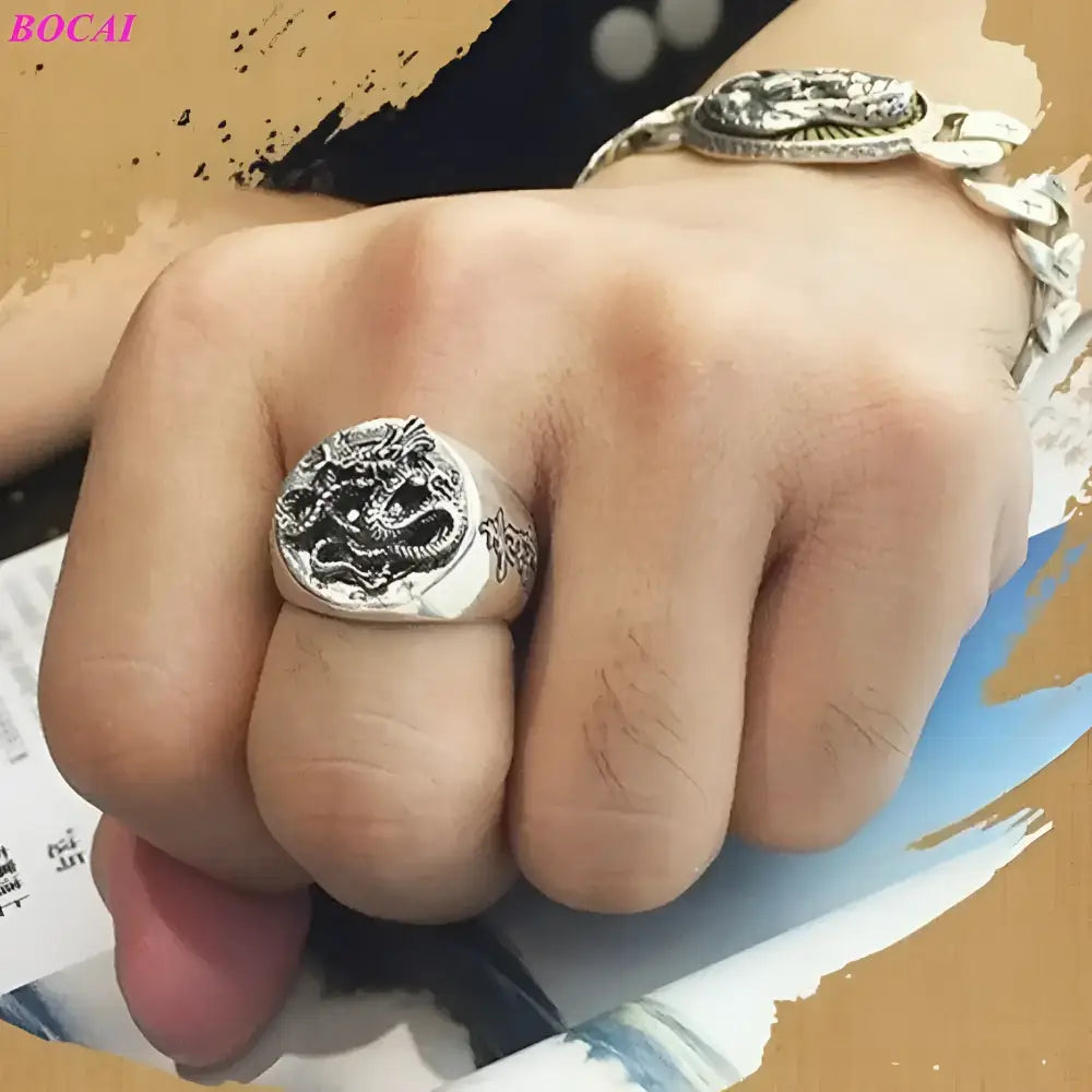 Silver dragon ring and bracelet.