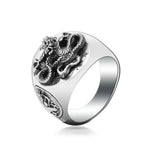 Silver dragon signet ring.