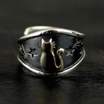 Silver ring with golden cat.