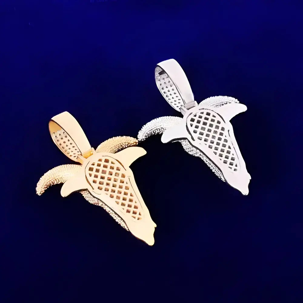 Gold and silver banana pendants.