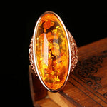Elegant Oval Amber Ring for Women - Golden Gothic Fashion Jewelry for Parties - Buzzastore
