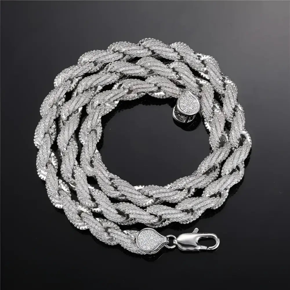 Silver braided diamond necklace.