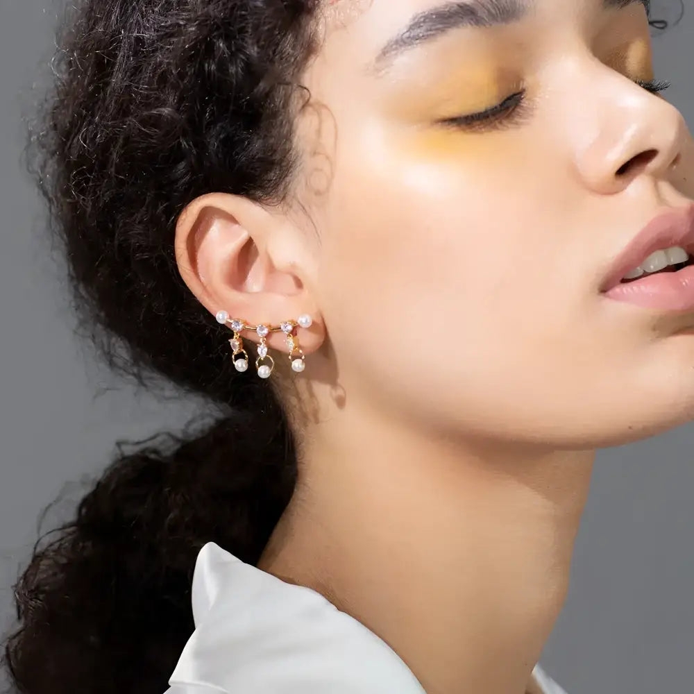 Ear climber earrings.