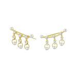 Gold-toned pearl and crystal ear climbers.
