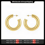 Pair of gold hoop earrings.