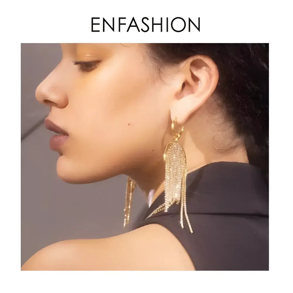 Sparkling gold tassel earrings.