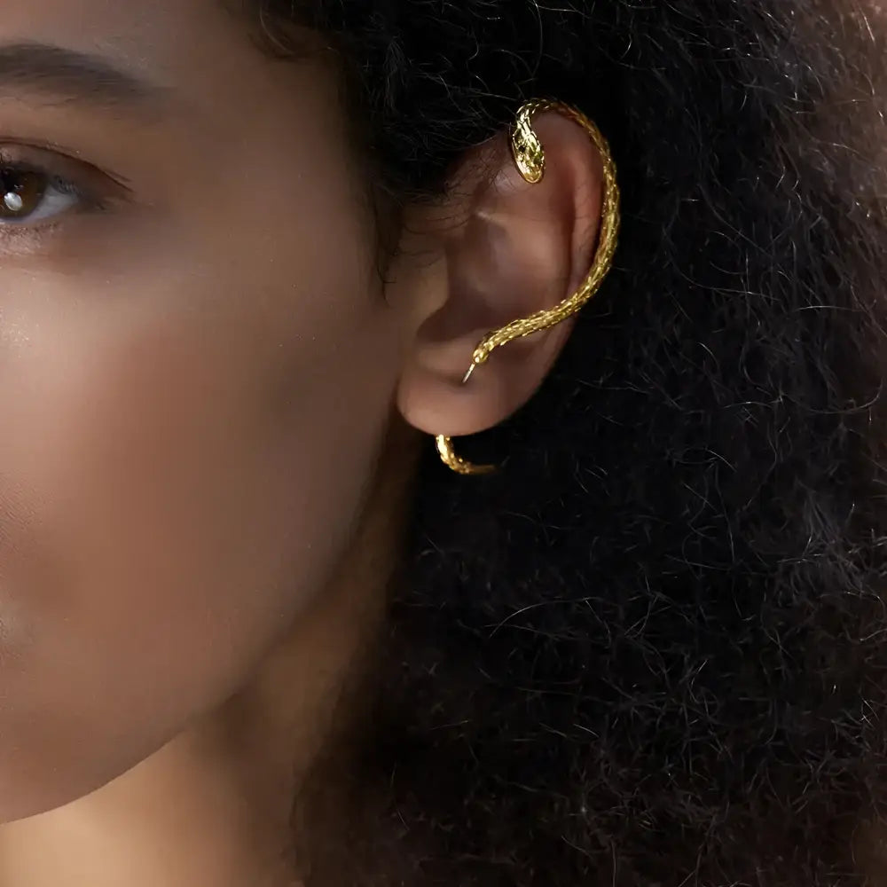 Golden snake ear cuff.