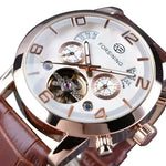 FORSINING black leather automatic watch featuring a brown leather band for men and women