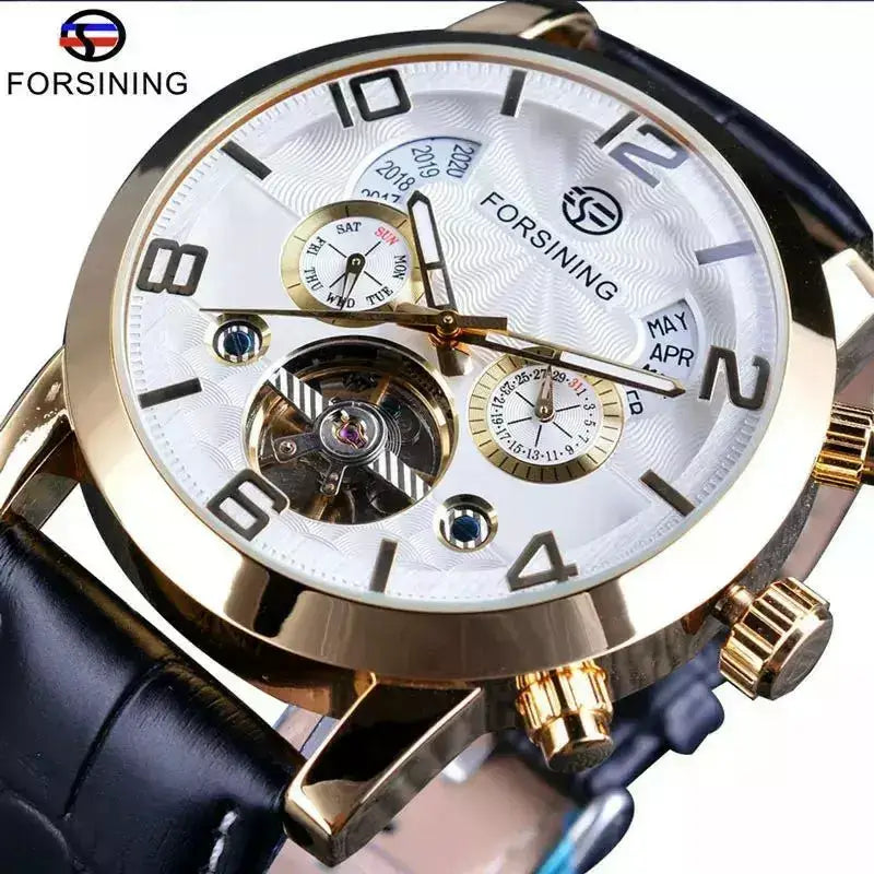 Gold-tone Forsining automatic watch with complications displayed on black leather strap
