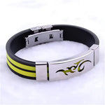 Black and yellow rubber bracelet with a silver clasp and tribal design.