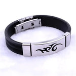 Black rubber bracelet with silver tribal design.