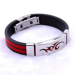 Black and red rubber bracelet with a silver clasp and tribal design.
