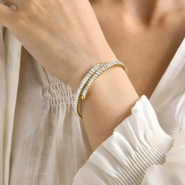 Gold and diamond spiral bracelet.