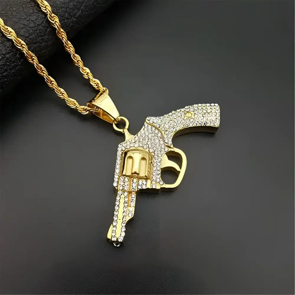 Gold gun pendant necklace.