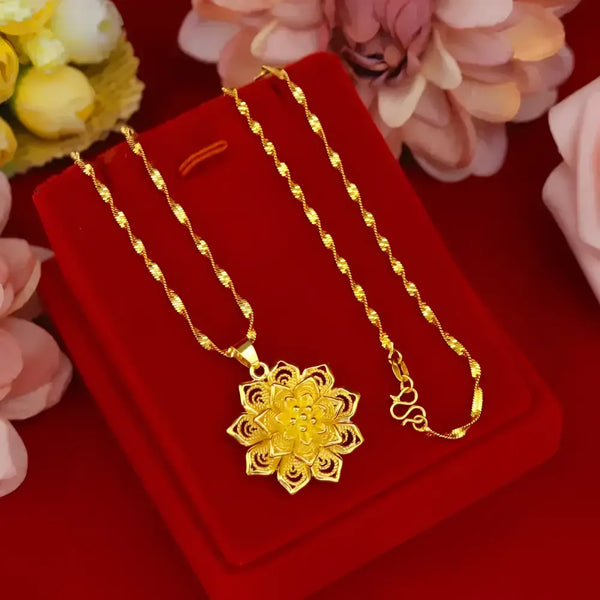 Gold flower pendant necklace.