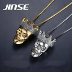 Skull and crown pendants.
