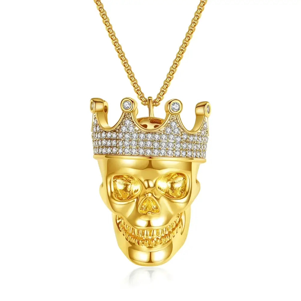 Gold skull pendant with jeweled crown.