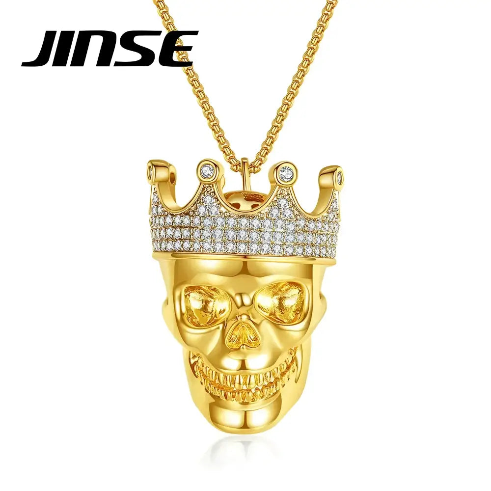 Gold skull pendant with crown.