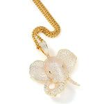 Gold chain with diamond-encrusted elephant pendant.